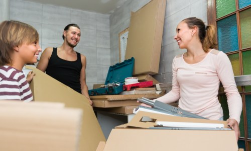 Office removals team preparing equipment in a Docklands business setting
