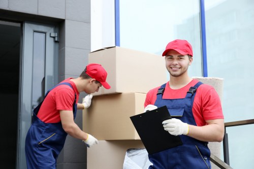 Supervisor reviewing safety procedures during a moving job