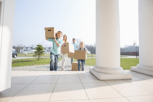 Removal team planning a flat move in Docklands apartment building