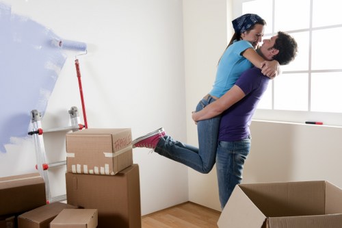 Moving van loading boxes and furniture during a Docklands relocation