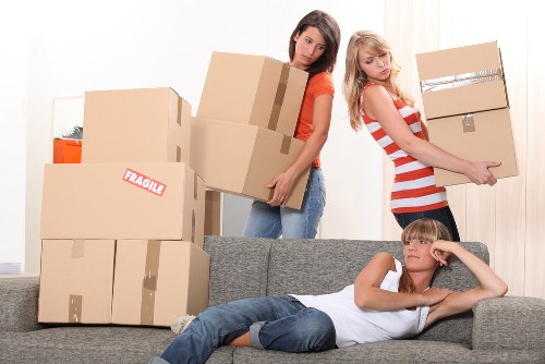 Packed moving boxes and urgent relocation items ready for transport