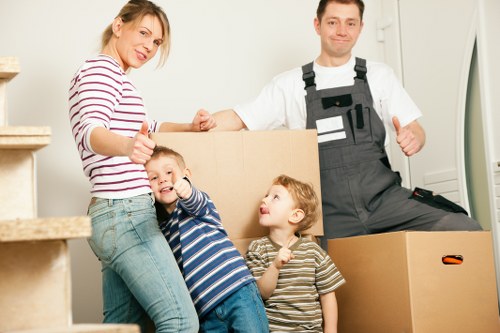 Packed boxes and furniture ready for removal van transport in Docklands